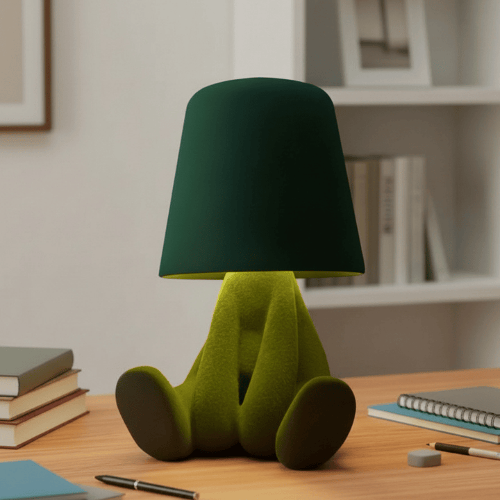 Modern humanoid LED desk lamp providing creative room lighting, perfect for unique home decor.
