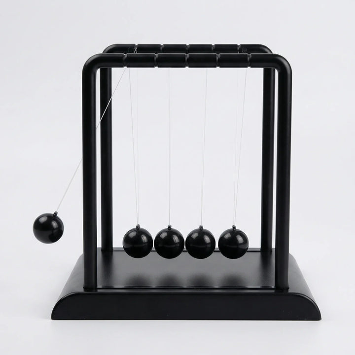 Calming kinetic desk sculpture, a modern tabletop ornament for office relaxation. Soothing magnetic art gift for peace.