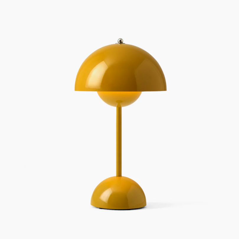 Bedroom-ready LumiTouch LED table lamp, featuring touch control & 3 light tones for customizable ambiance.