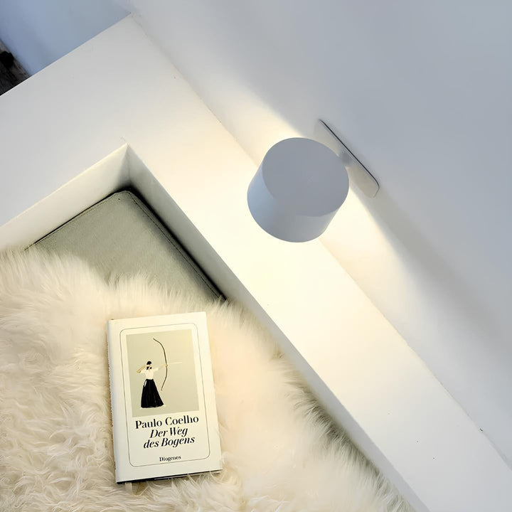 Modern magnetic LED wall lamp, dimmable & rechargeable. LumoFlex wireless lighting for home.