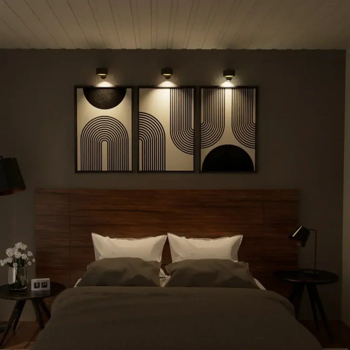 Modern LumoFlex wall light, rechargeable with dimmable LED. Perfect for versatile home decor.
