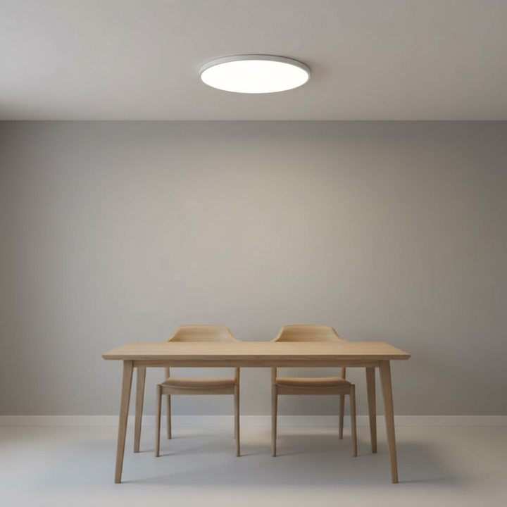 Modern minimalist LED ceiling light, round & flat. Perfect for contemporary home decor & ambient lighting.