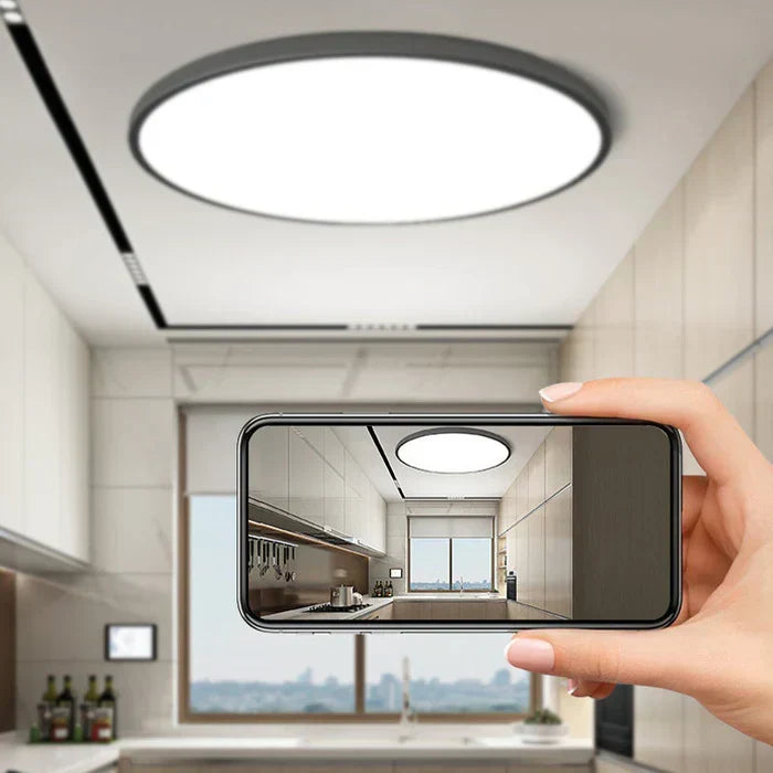 Sleek LED ceiling light for modern homes. Provides energy-efficient, ambient lighting with minimalist style.