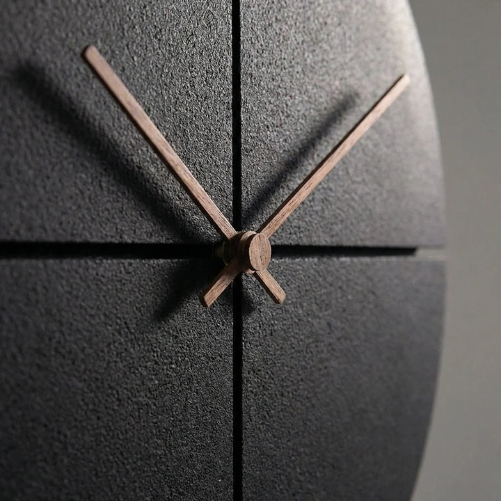 Elegant minimalist wall clock with a silent sweep movement, perfect for modern office or living room decor.