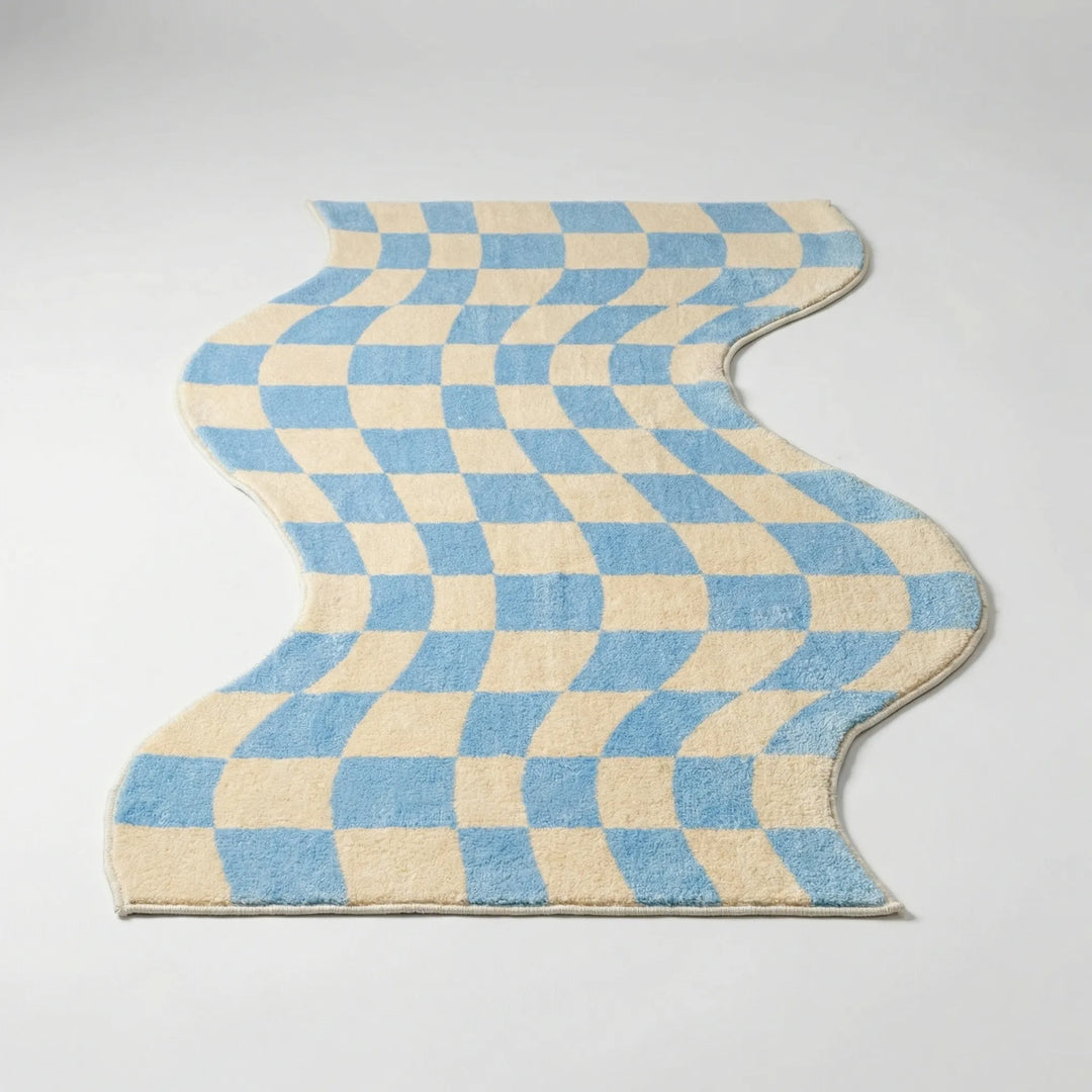 Statement wavy pastel area rug, modern floor mat with check pattern, adds cozy home decor.