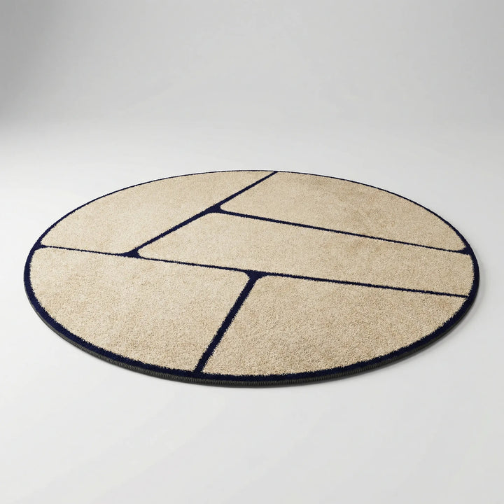 Soft washable round area rug featuring elegant Flowique wave patterns, perfect for modern bedroom or entry decor.