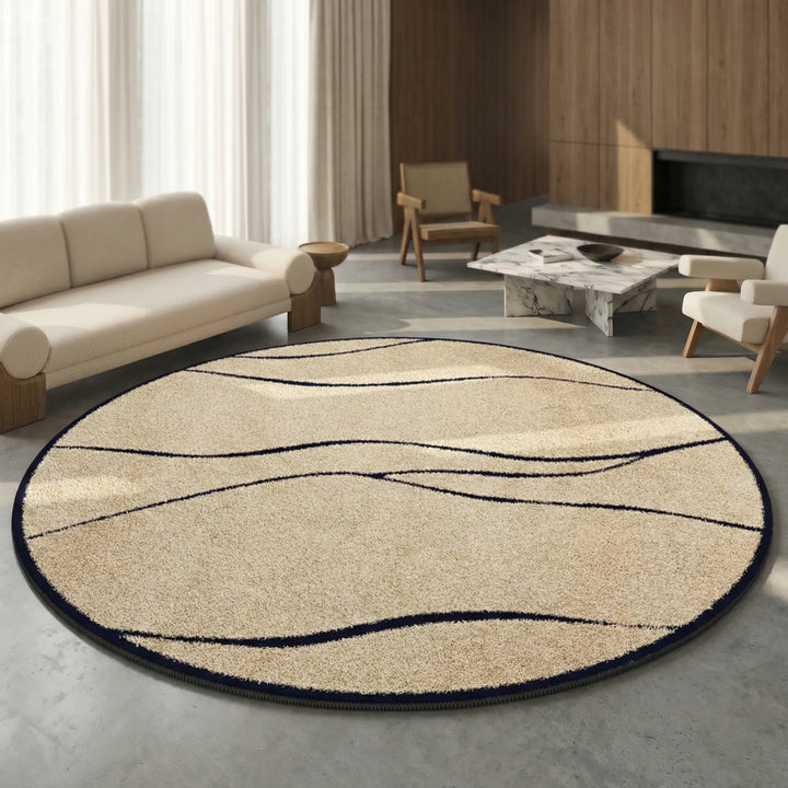 Elegant round bedroom rug with modern wave design, low pile and soft for a cozy, contemporary feel. Home decor.