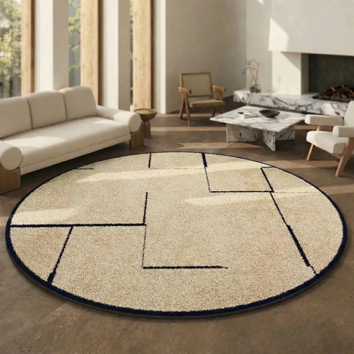 Statement round area rug with modern wave pattern, low pile and washable for contemporary home interior decor.