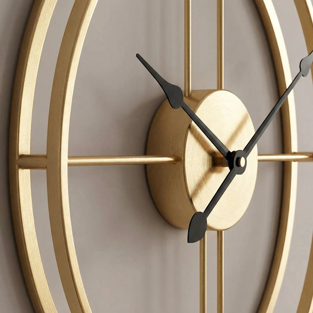 Stylish gold and black modern wall clock. A sleek, round design for a sophisticated interior.