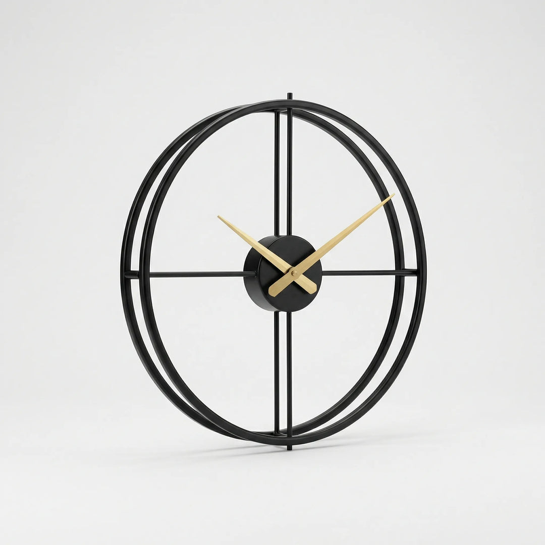 Close-up of a minimalist round wall clock showing its sleek black finish and precise time.