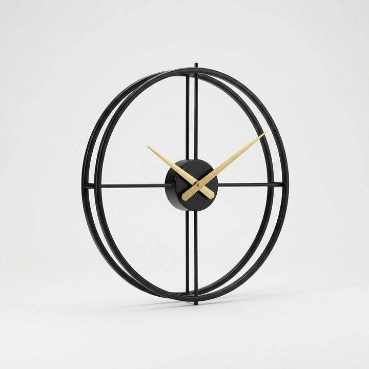 Close-up of a minimalist round wall clock showing its sleek black finish and precise time.