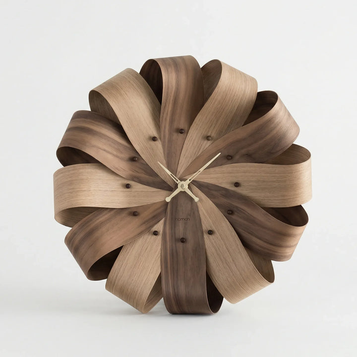 Decorative modern sculptural wall clock. Large, unique design, perfect for sophisticated home or office decor.