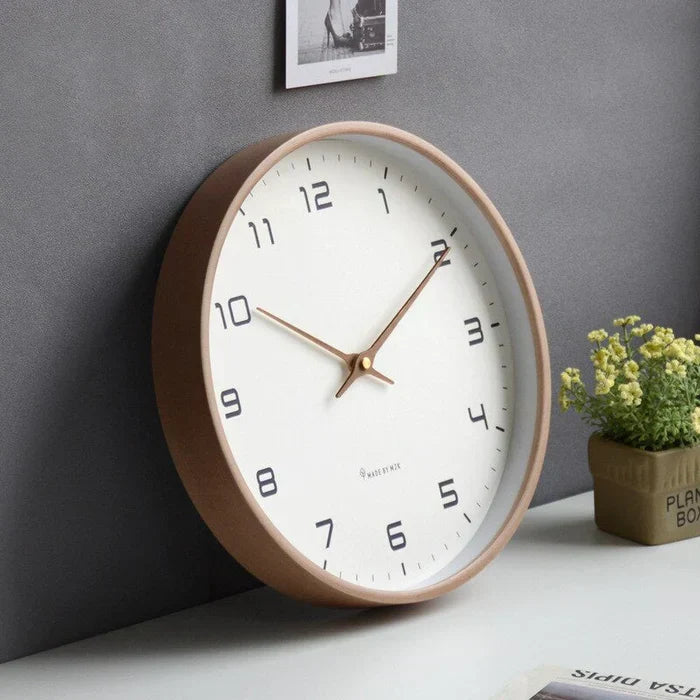 Stylish wooden wall clock for home decor, silent movement, ideal for modern living rooms.