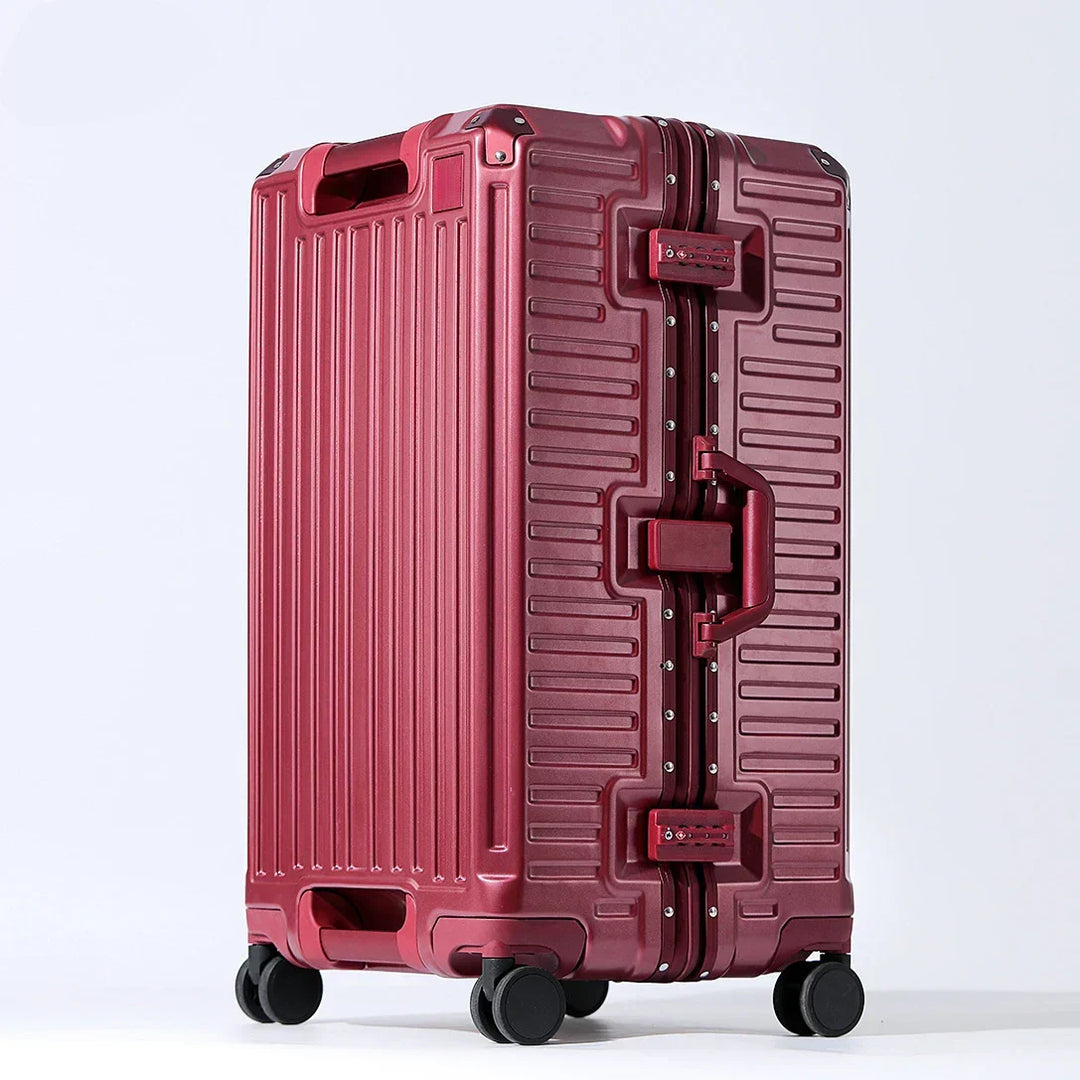 Modern unisex hardshell travel suitcase with wide grip handle & spinner wheels for easy mobility.