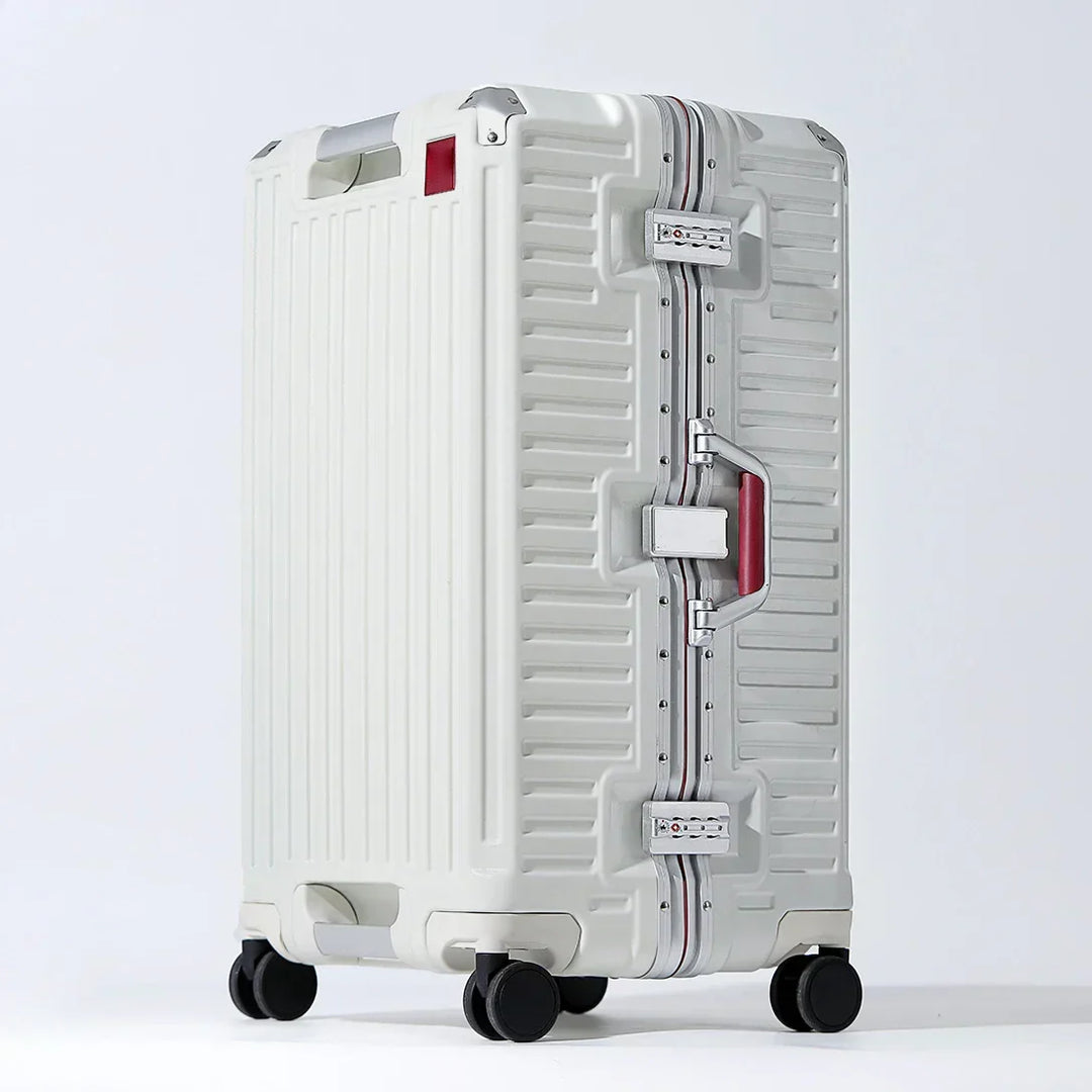 Sleek hardshell travel suitcase with ergonomic wide grip handle, durable & easy to maneuver.