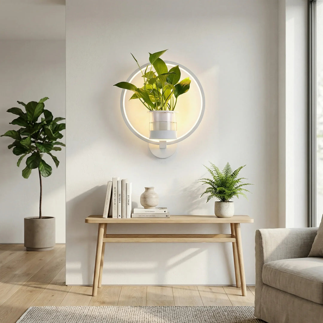 Modern wall mounted plant lamp with holder providing ambient indoor lighting for a living room.