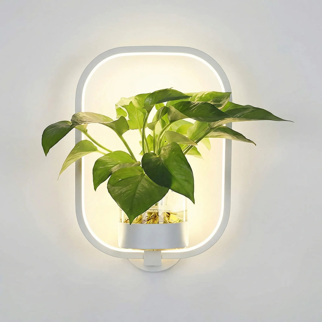 Close-up of a wall mounted plant lamp, showcasing its modern design and ambient light glow.