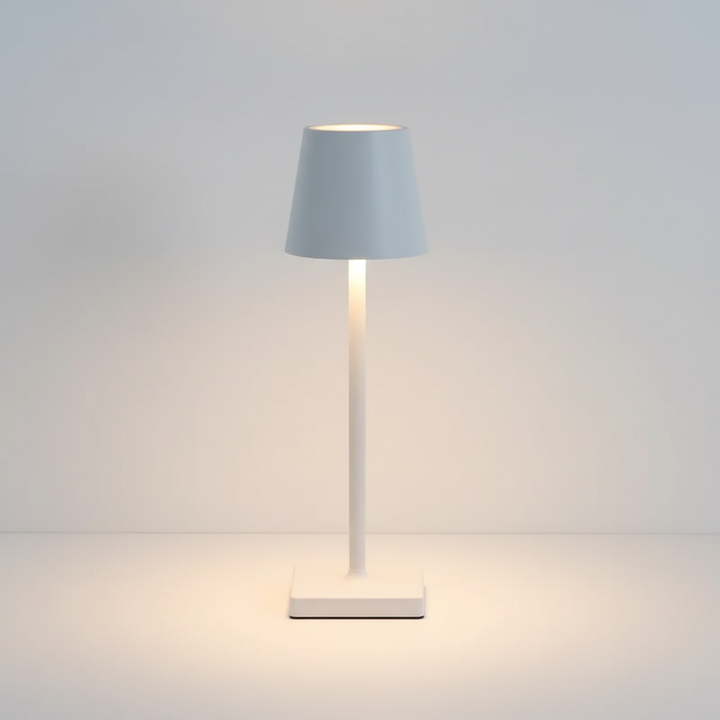 Scandinavian dimmable LED table lamp, portable & wireless for versatile ambient lighting. Modern decor.