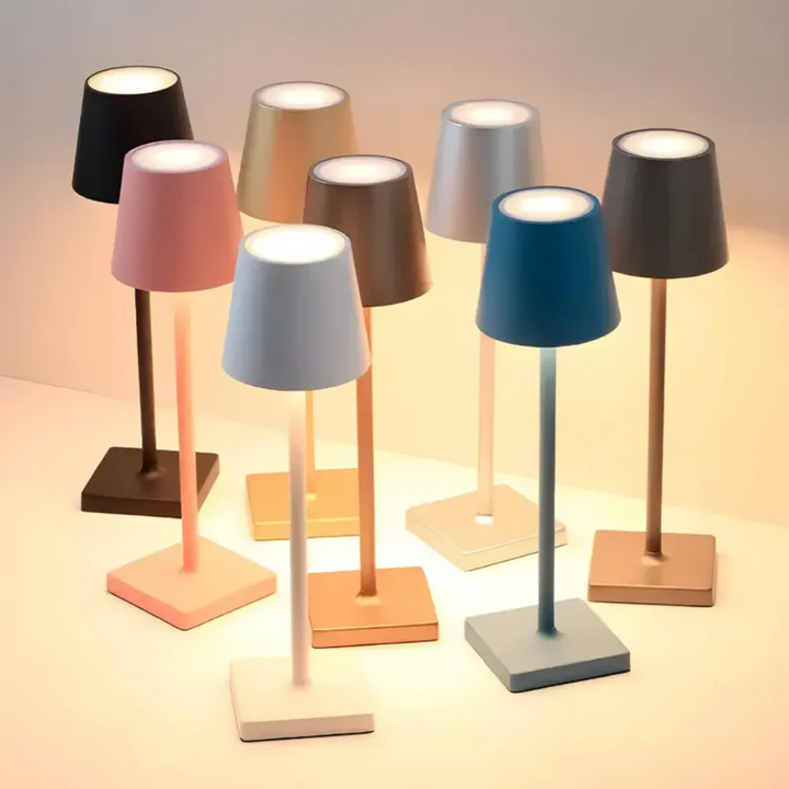 Portable dimmable LED table lamp, wireless functionality for creating perfect ambiance anywhere. Modern design.
