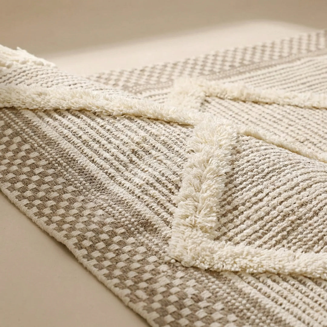 Textured geometric Moroccan runner rug with fringe, designed for bedroom or hallway. Machine washable for easy care.