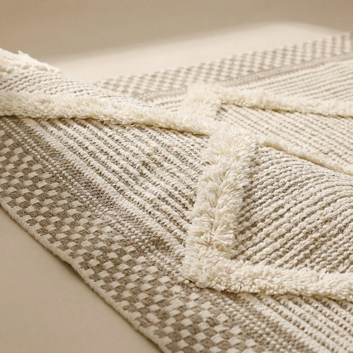 Textured geometric Moroccan runner rug with fringe, designed for bedroom or hallway. Machine washable for easy care.