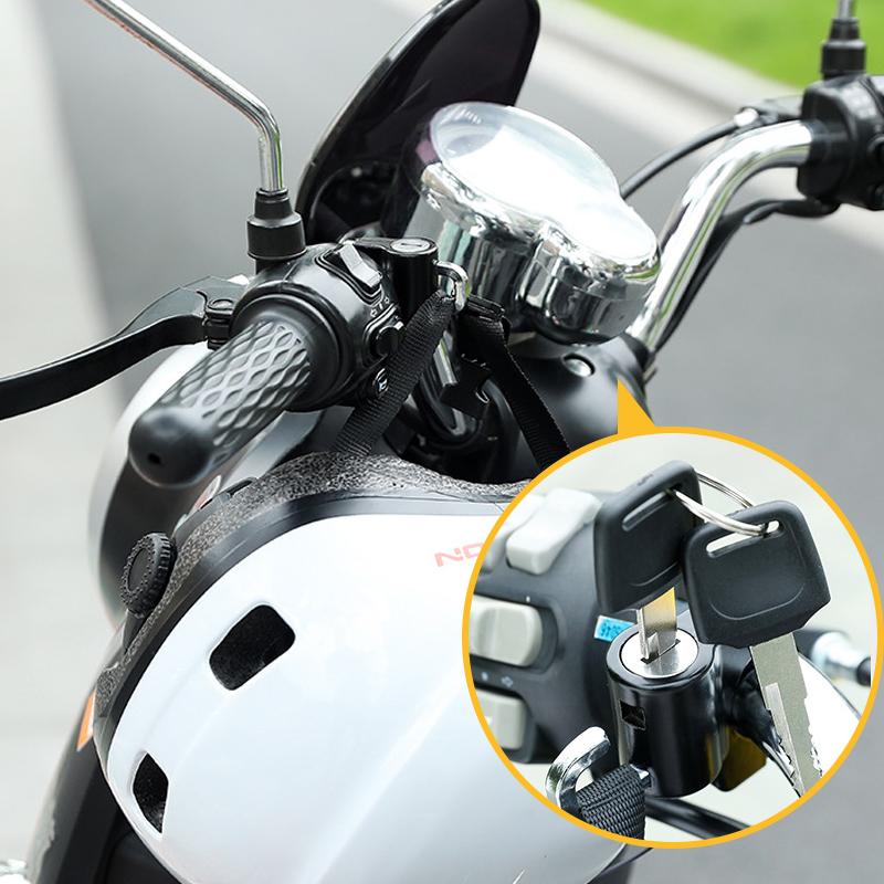 Close-up of aluminum alloy motorcycle helmet lock, showing key mechanism, anti-theft bike security