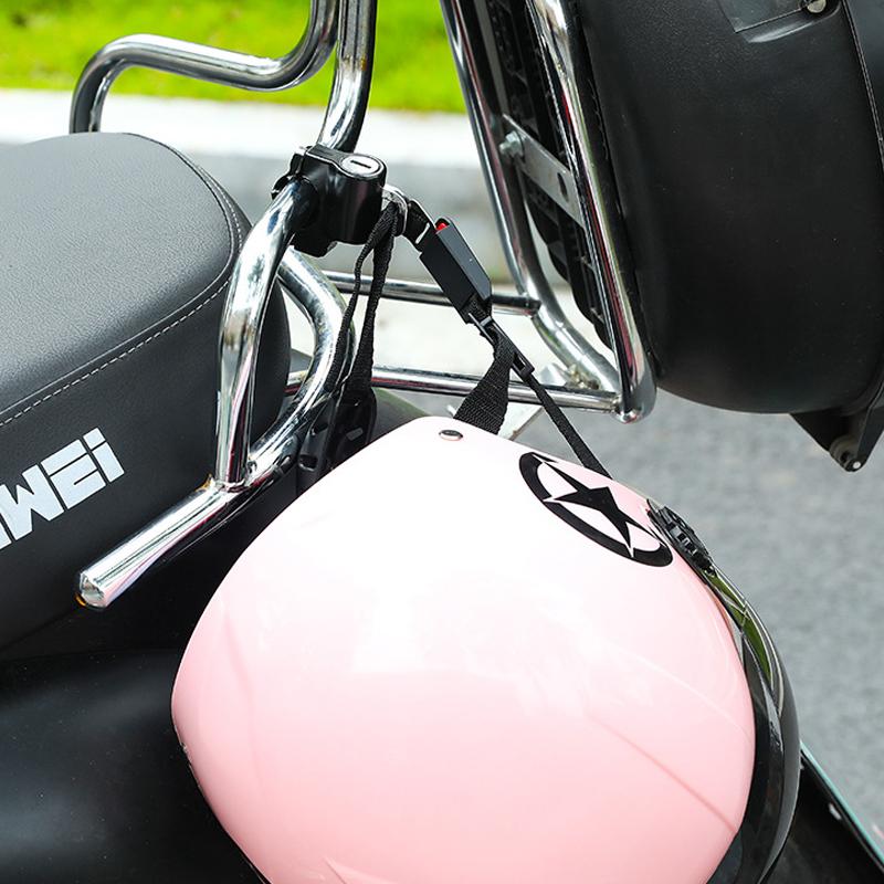 Motorcycle helmet security lock with helmet, showing simple installation onto bike frame, anti-theft accessory