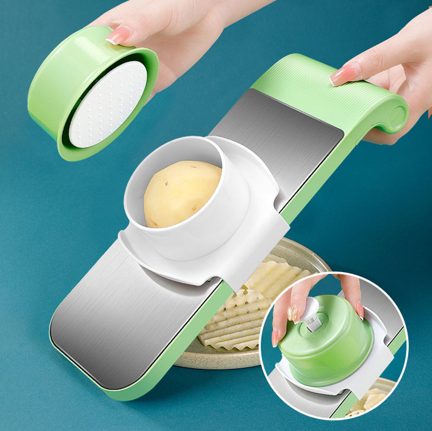 Handheld vegetable slicer with different attachments for various cuts