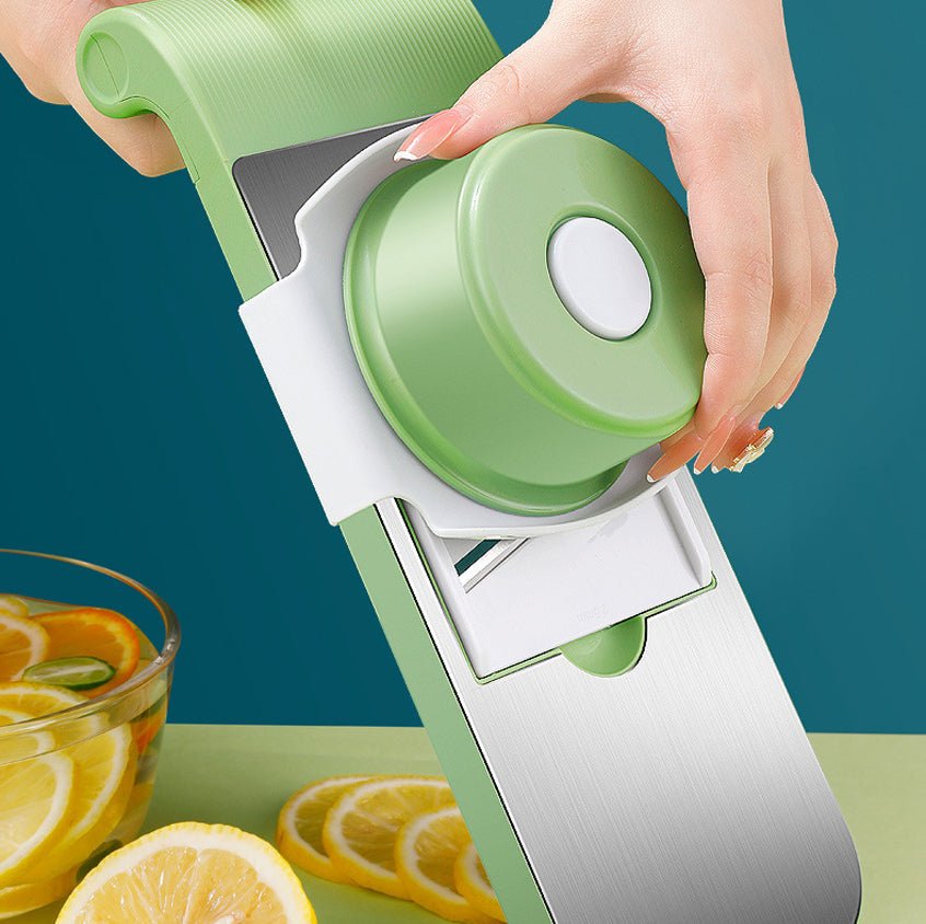 Vegetable slicer in action, cutting carrots with ease for meal prep