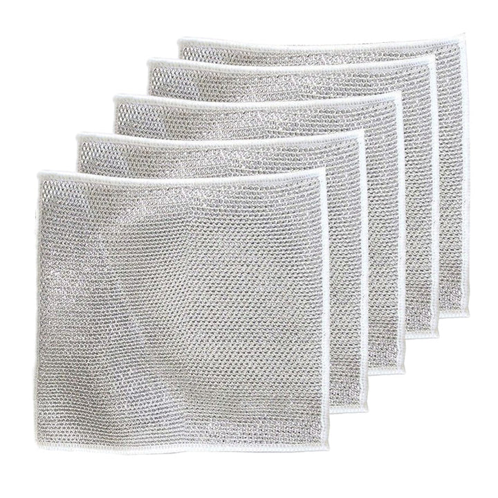 Stack of non-scratch metal fiber dishcloths, highlighting their compact and efficient design