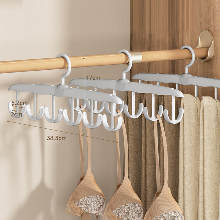 Eco-friendly plastic clothes hanger with a durable rotating hook for sustainable wardrobe organization