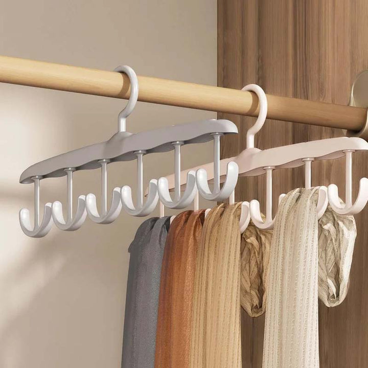 Heavy-duty plastic clothes hanger, perfect for organizing garments, featuring a swivel hook design