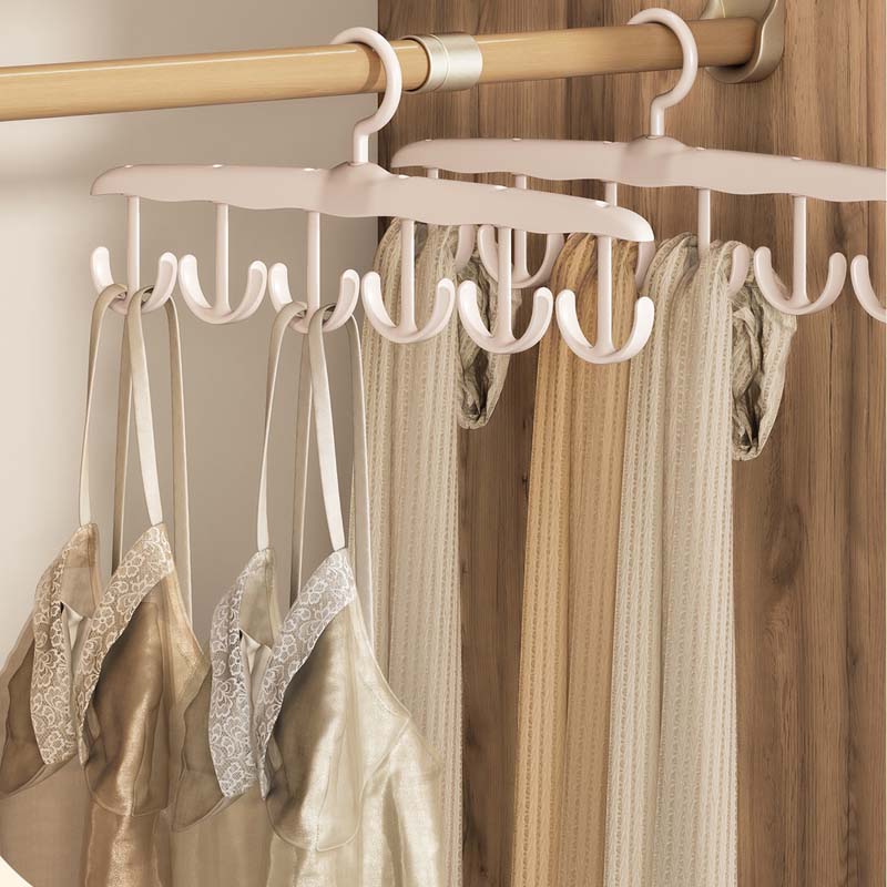Durable plastic clothes hanger with rotating hook, great for closet organization and garment storage
