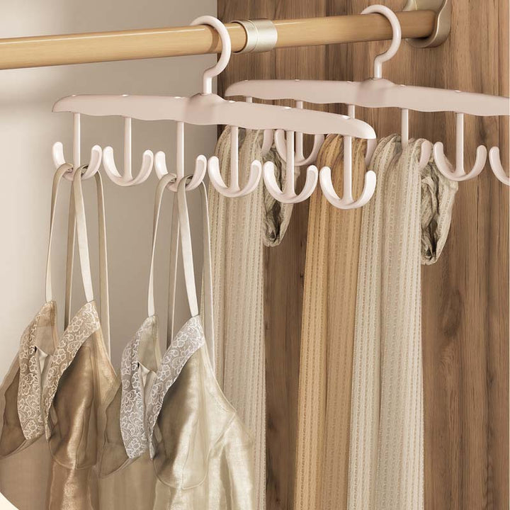 Durable plastic clothes hanger with rotating hook, great for closet organization and garment storage