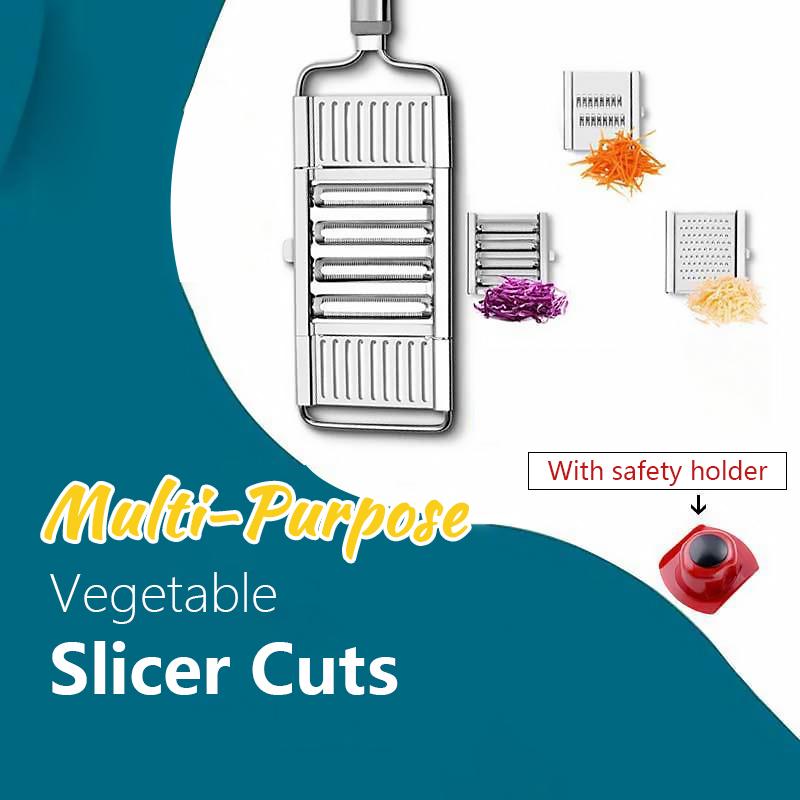 Close-up of a kitchen vegetable cutter showing interchangeable grater and shredder blades