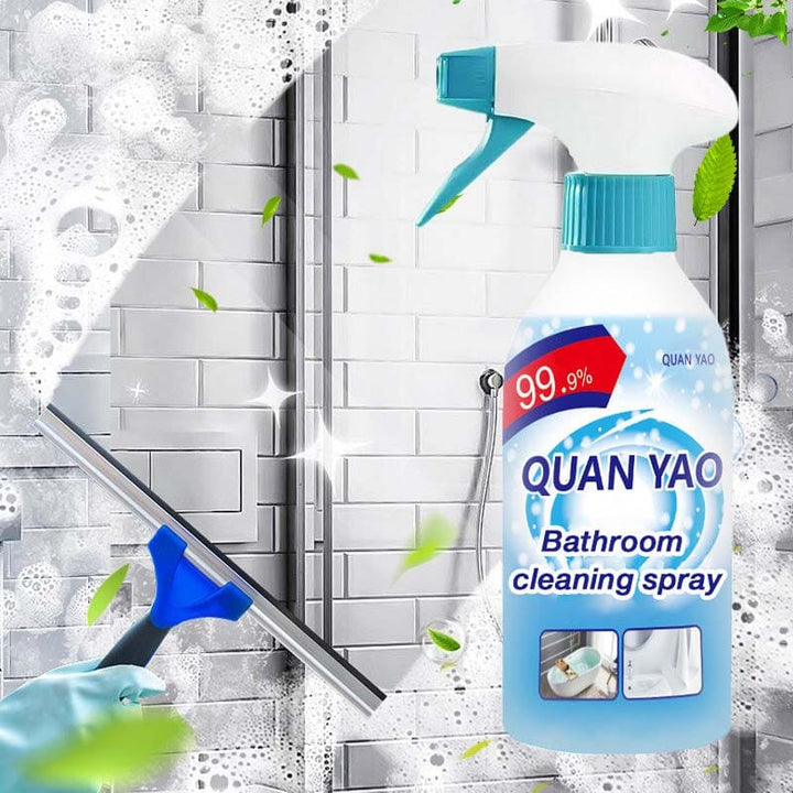 Hand holding a spray cleaner from the bathroom cleaning kit, demonstrating ease of use.
