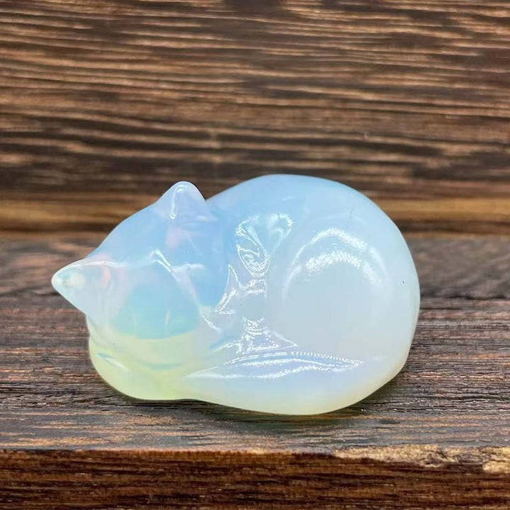 Garden ornament: sleeping cat sculpture made of natural stone, durable and charming animal figurine