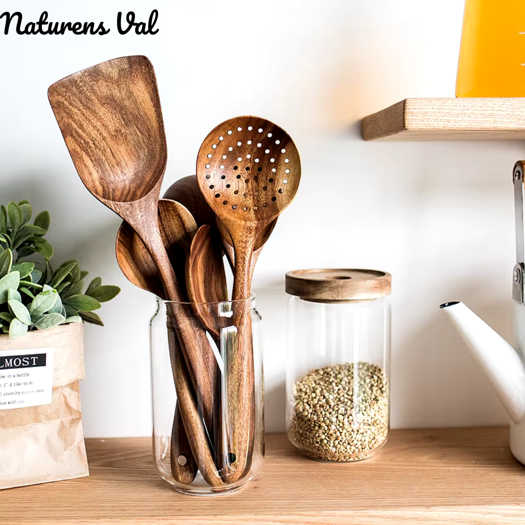 Elegant teak wood kitchen utensil set, a perfect eco-friendly gift for home chefs. Natural, durable cooking tools.