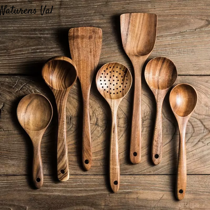 Sustainable natural wood kitchen utensils. Complete teak wood cooking tool set for healthy, eco-friendly meal prep.