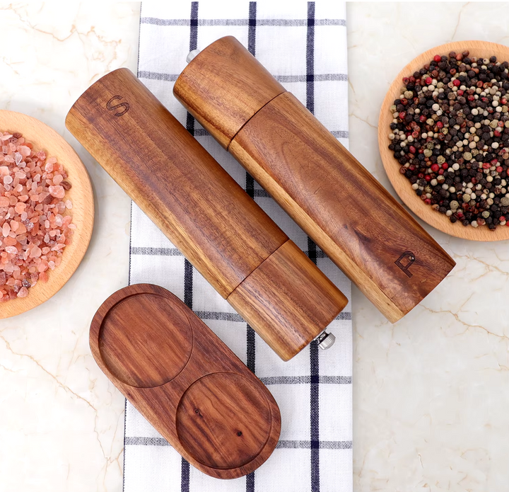 Essential natural teak wood cooking tools. Eco-friendly wooden spoon set for a sustainable kitchen.