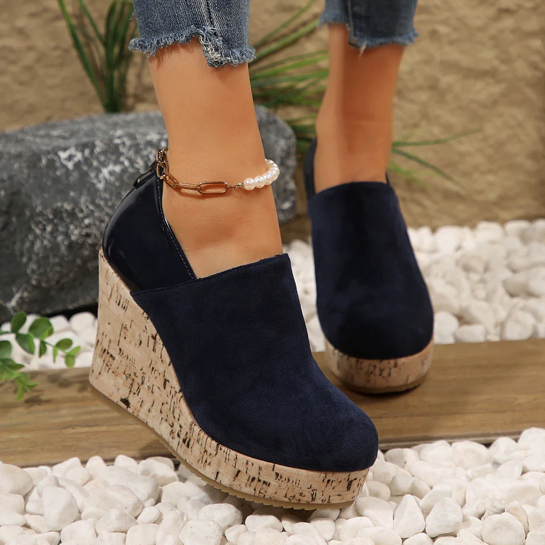 Front view of women's deep black orthopedic wedge loafers, slip-on casual shoes