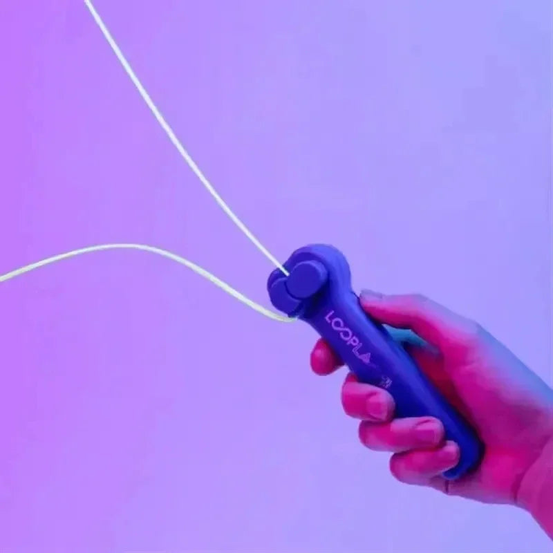 NeonLoopr handheld glow string shooter toy for interactive fun, perfect for active play & novelty.