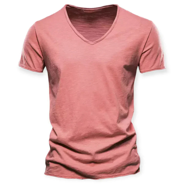 Man wearing a comfortable men's V-neck t-shirt, a versatile short sleeve top for casual everyday fashion.
