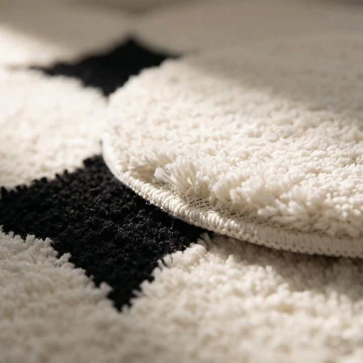 Modern Flowique wave bath mat. Ultra-absorbent & non-slip for safe bathroom comfort. Adds stylish decor to your home.
