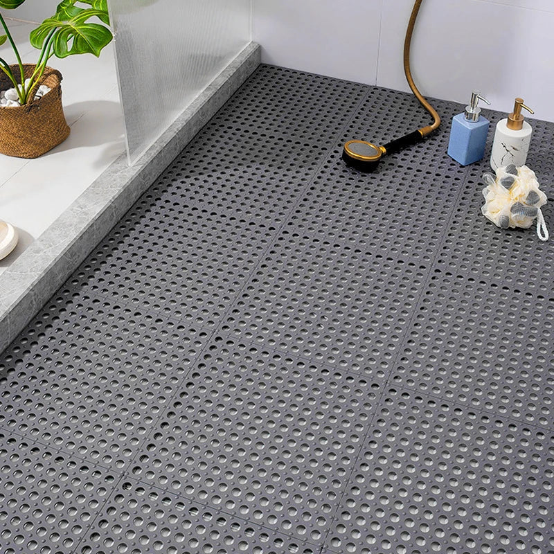 Non-slip shower mat set for enhanced bathroom safety. Prevents slips and falls on wet bathroom floors & tubs.