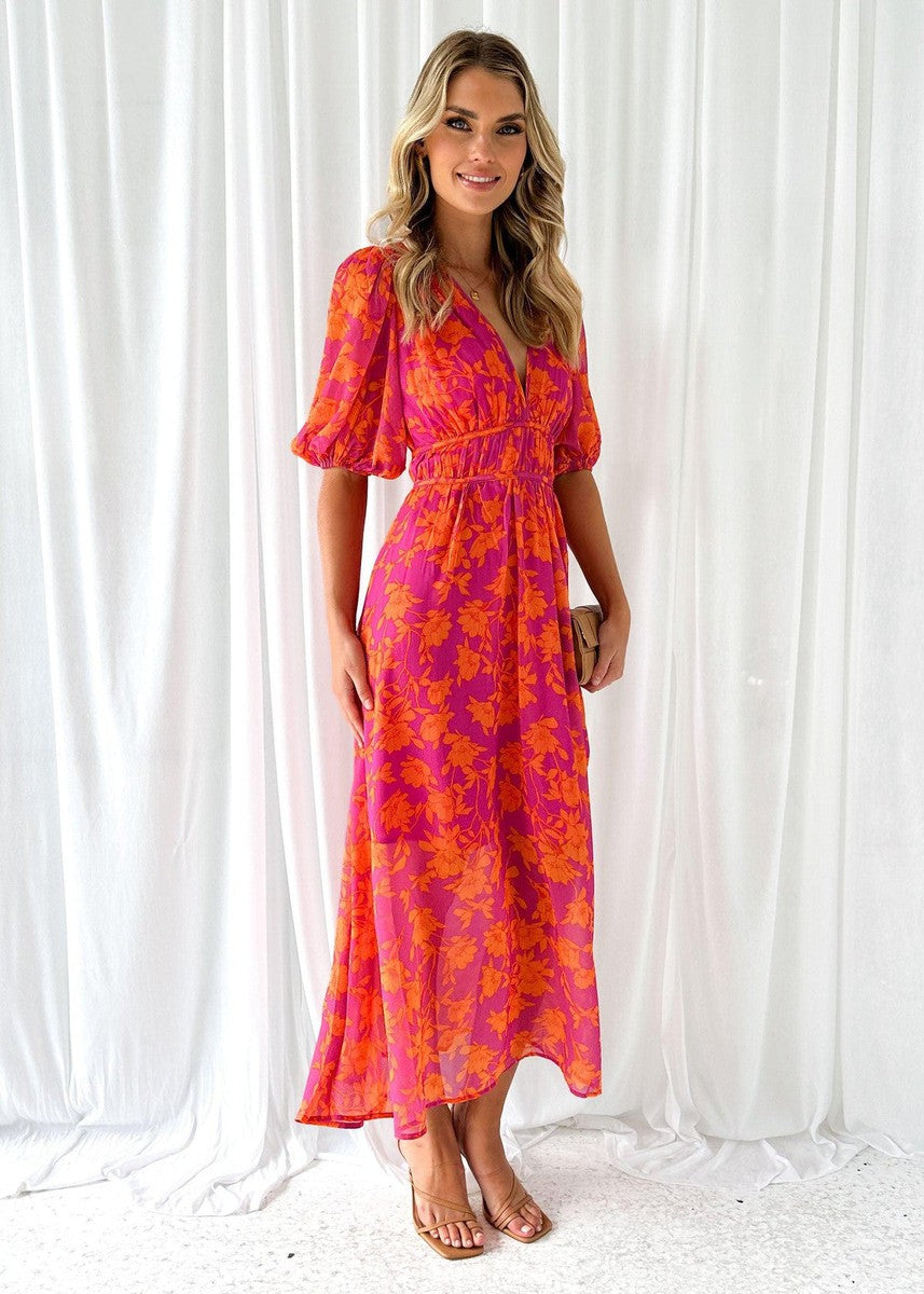 Elegant orange floral midi dress, women's spring fashion. V-neck, puff sleeve, ideal for wedding guests & parties.
