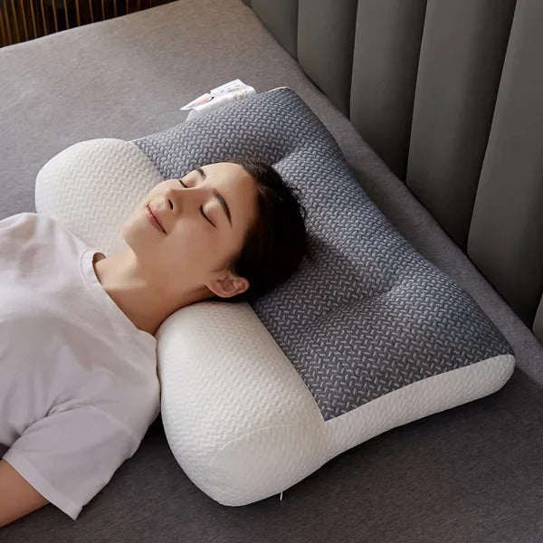 Orthopedic neck pillow for pain relief. Ergonomic design supports spinal alignment for comfortable, restful sleep.