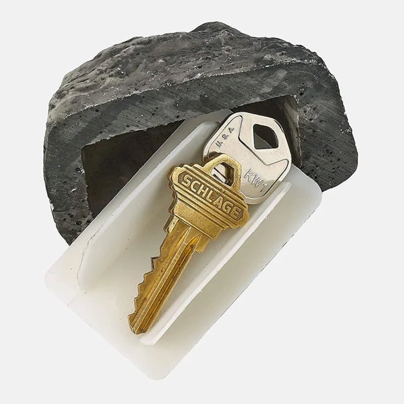 Faux rock key container, weatherproof and realistic, blends into outdoor environment