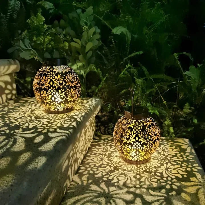 Energy-efficient LED solar pendant light illuminating a patio at night, controlled by remote. Easy outdoor setup.