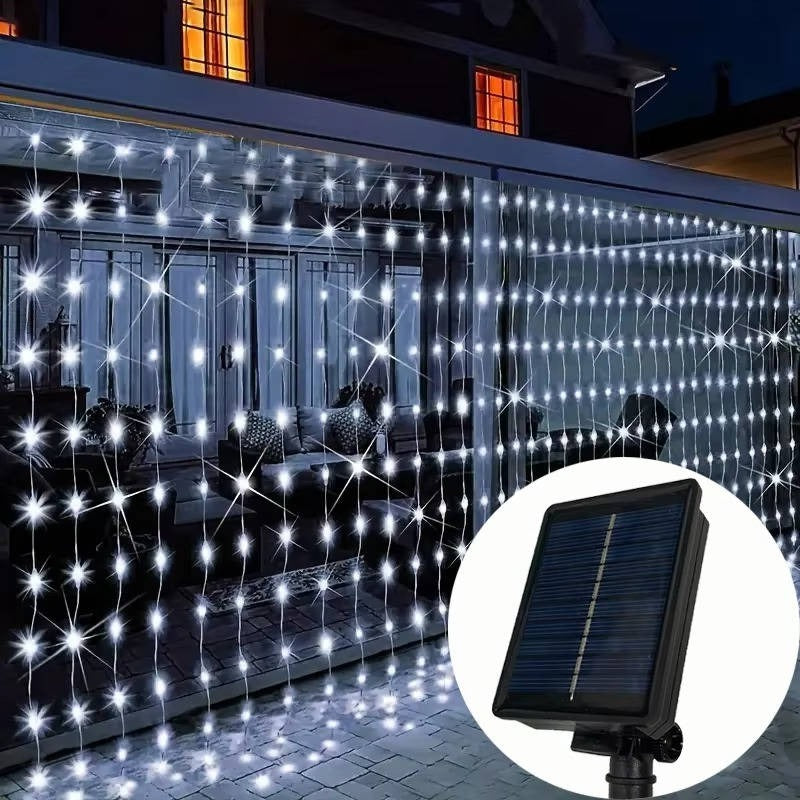 Energy-saving solar curtain lights, multicolor, enhancing patio decor. Automatic outdoor LED fairy lights.